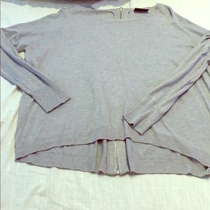 Grey sweater with zipper back detail. Size Medium.